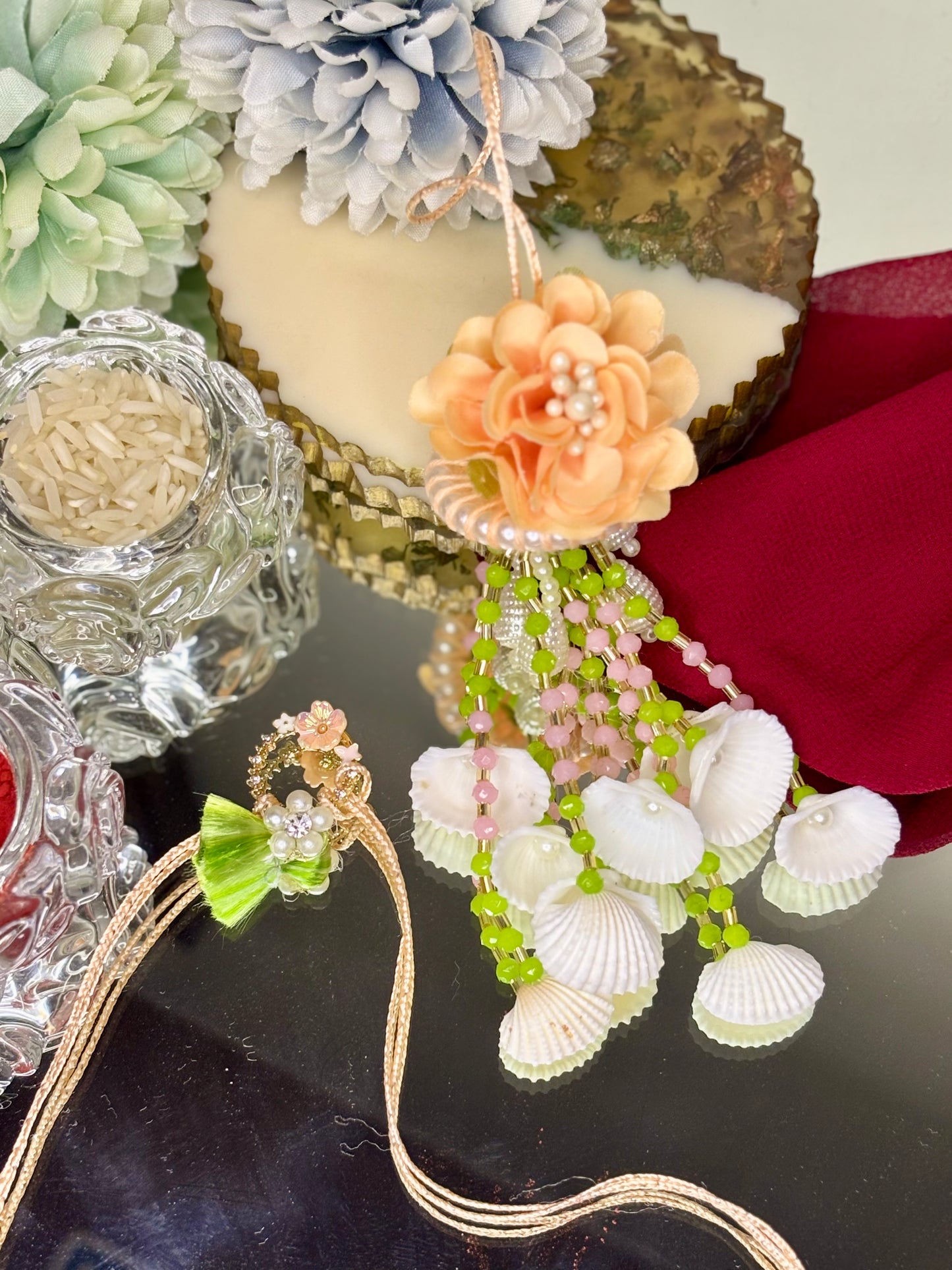 Flower and Shell Rakhi Pair