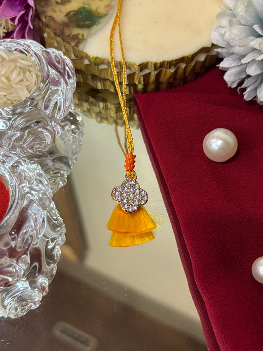 Orange Bhagwanji Lumba Rakhi