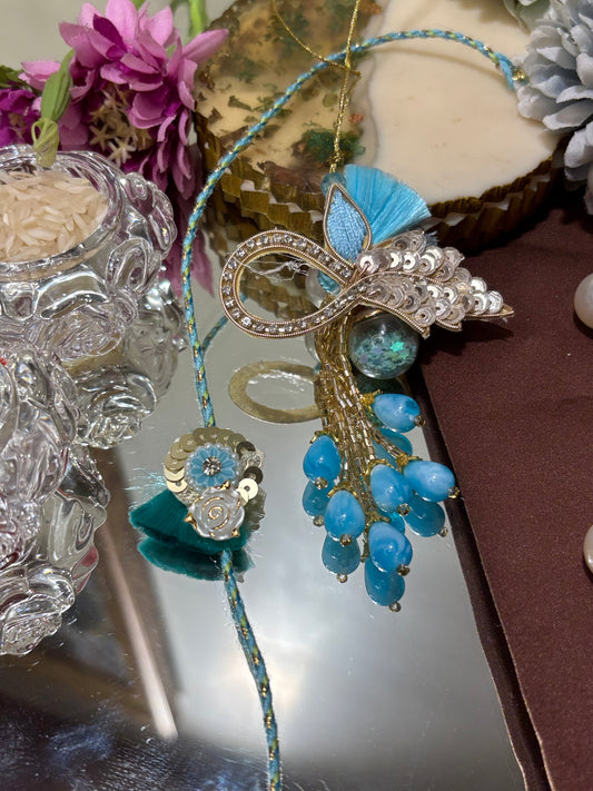 Blue Tara Work Rakhi Pair