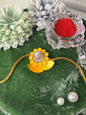 Yellow Blooming Pearl Rakhi